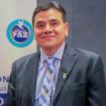Edgardo Flores - Secretary & American Link Person